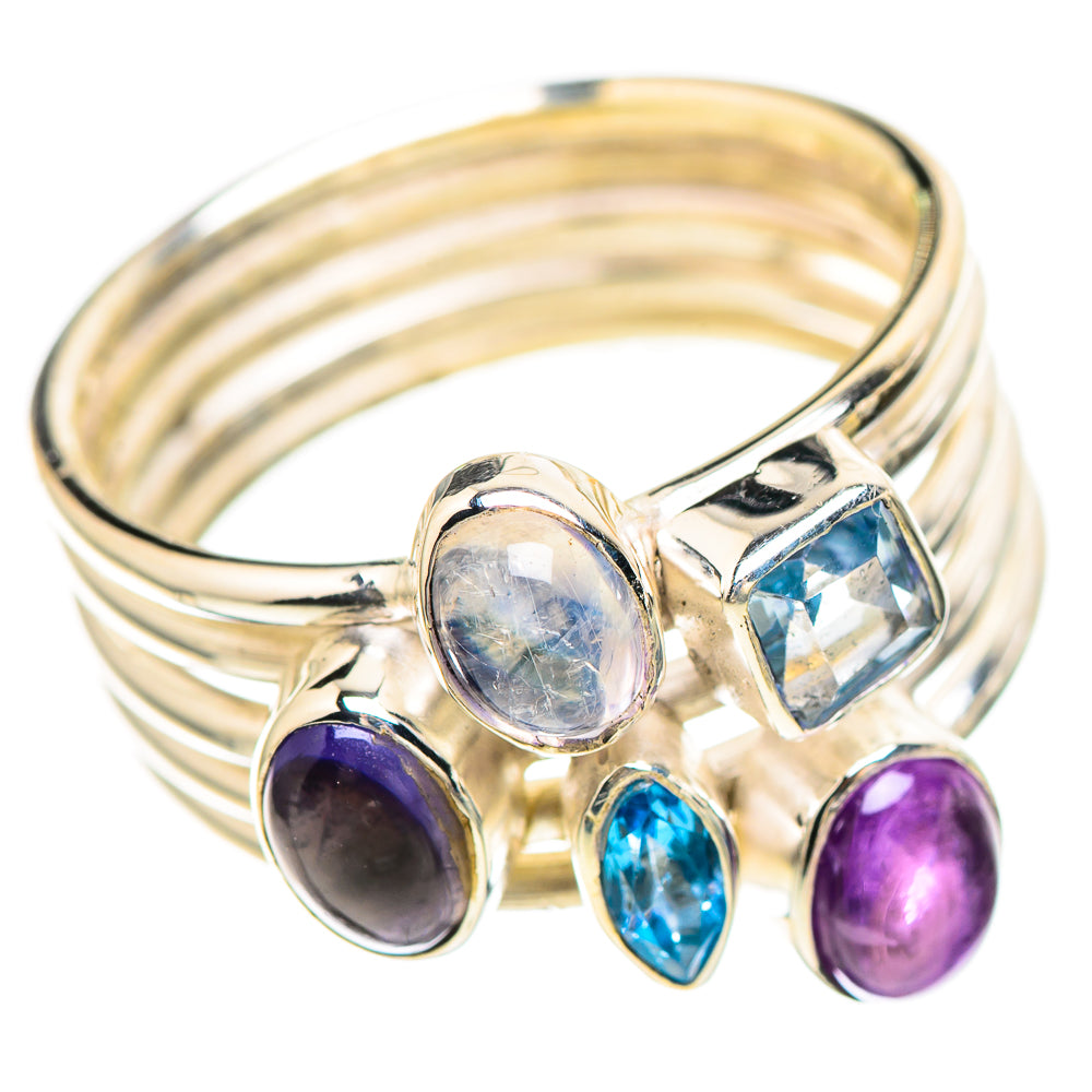 Sterling silver multi-stone ring with oval light stone, blue facets, and purple ovals