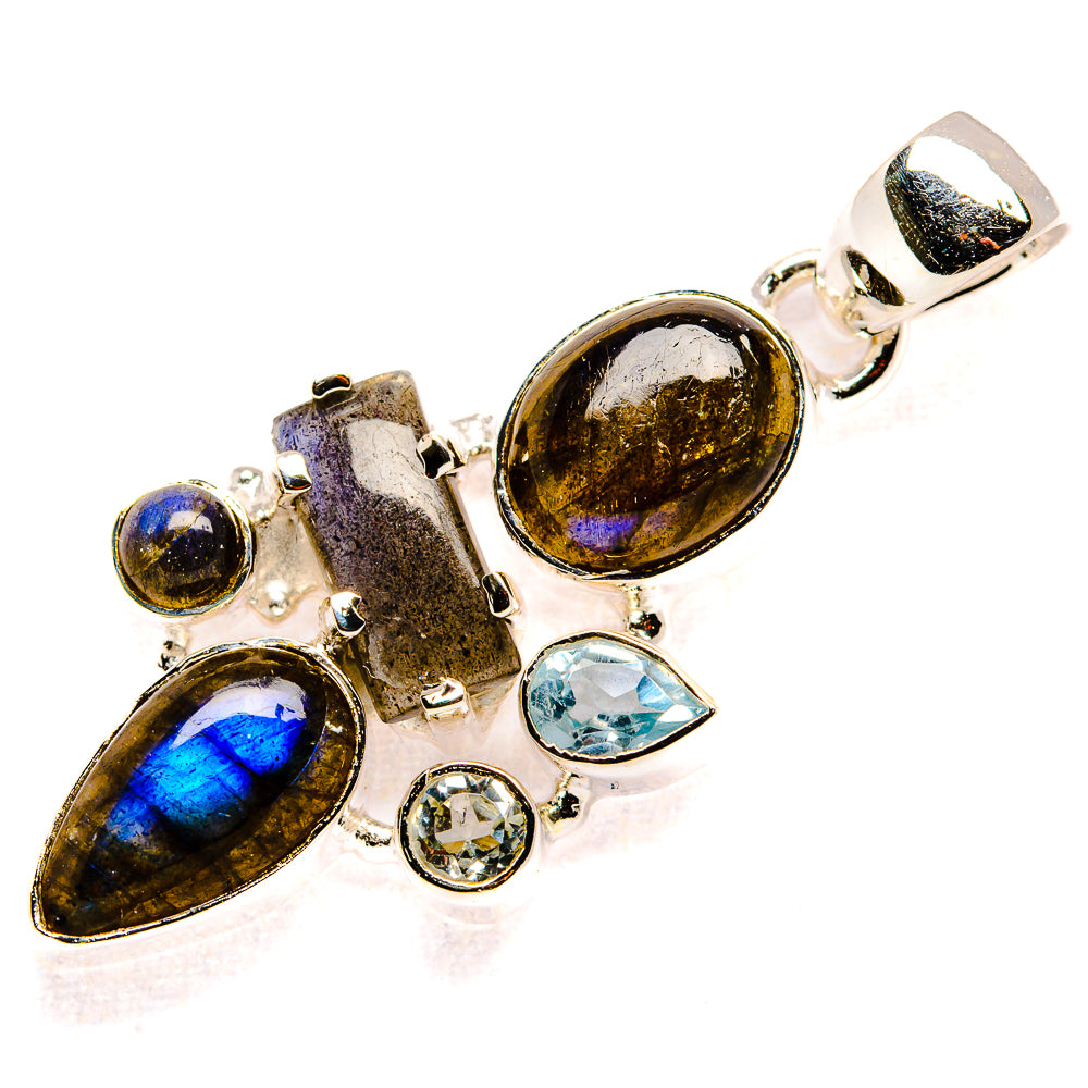 Sterling silver gemstone pendant with oval labradorite, blue teardrop topaz, clear stones
