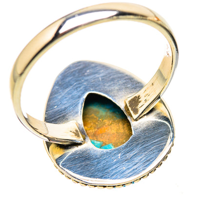 Sterling silver spiny oyster oval ring with open band and turquoise-orange center stone