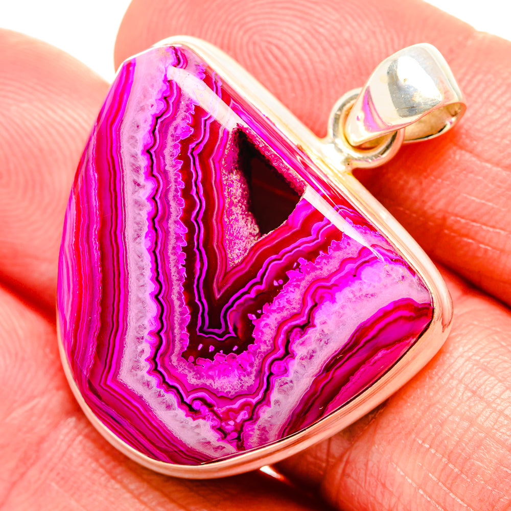 Pink druzy window pendant in sterling silver, with gold-tone bail and loop