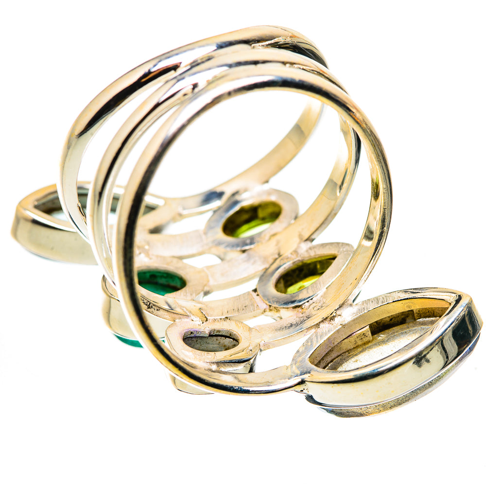 Open-back silver gemstone ring with oval bezel stones and a curved band