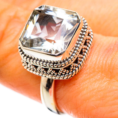 Sterling silver quartz ring with clear cushion-cut stone and beaded bezel