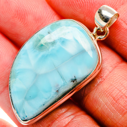 Larimar pendant in teardrop bezel with 925 sterling silver bail, blue stone.