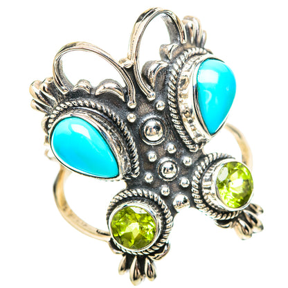 Ornate 925 sterling silver ring with turquoise and three peridot green stones
