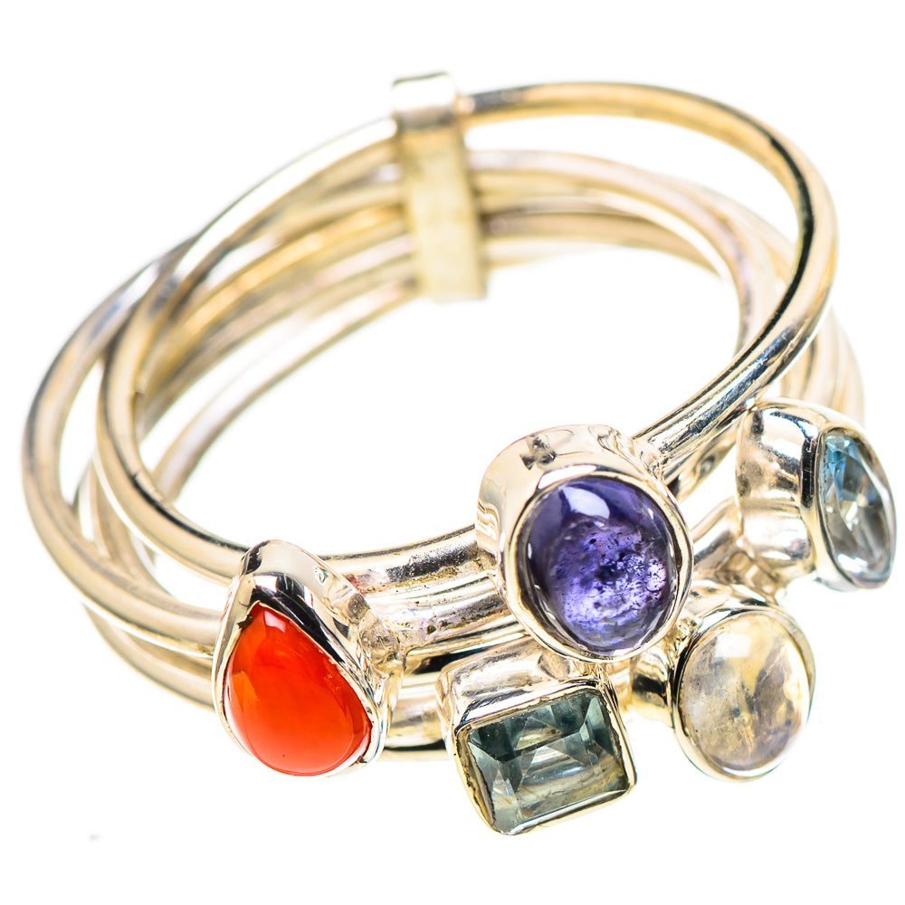 Silver gemstone ring with purple round, red oval, blue square, and pale opalescent cabochons