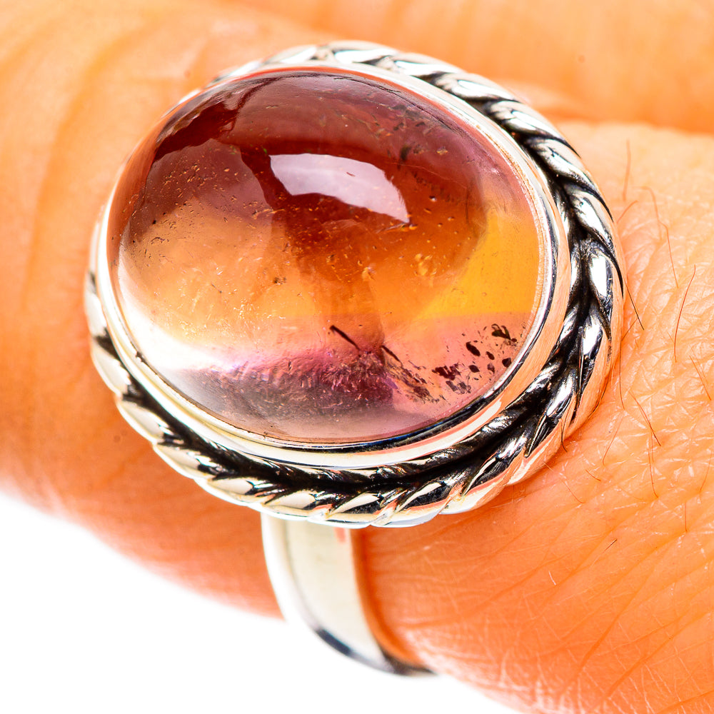 Sterling silver oval ametrine cabochon ring with braided rope-style bezel