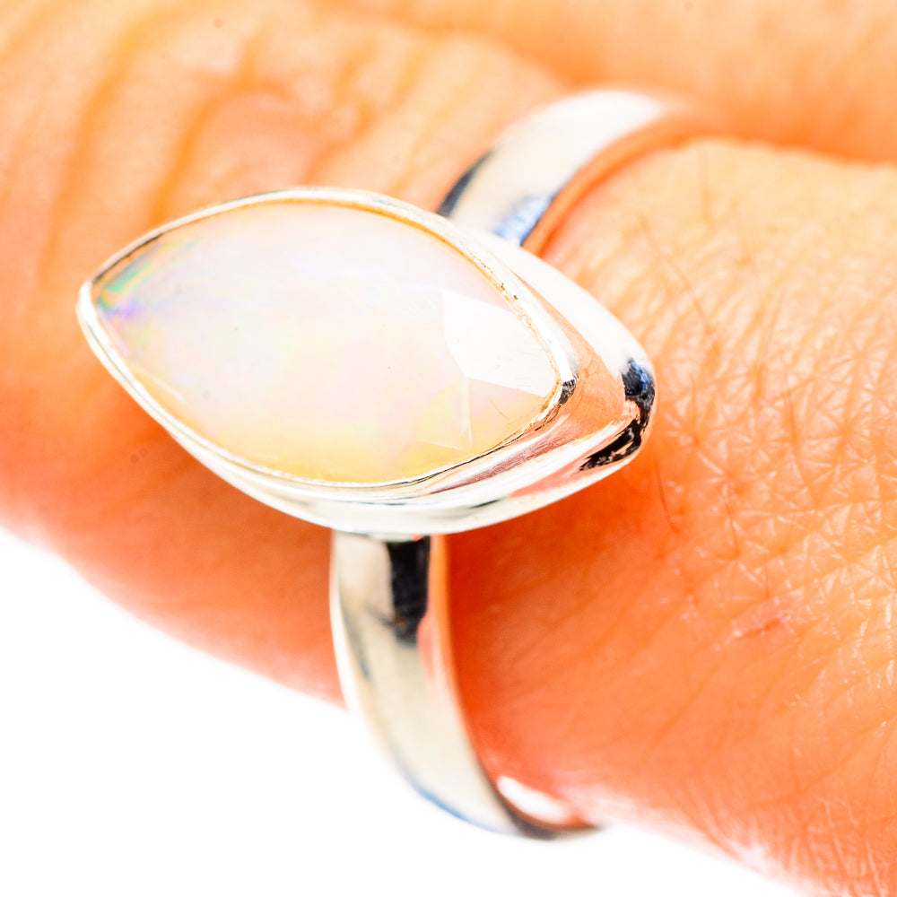 Oval Ethiopian opal set in sterling silver ring band, size 9