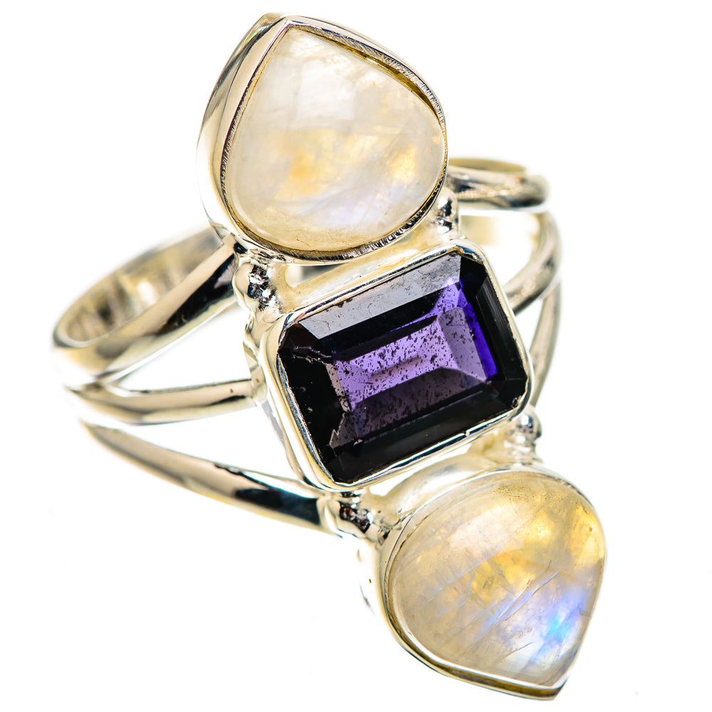 Sterling silver ring with square faceted dark-purple center stone and two oval rainbow moonstones