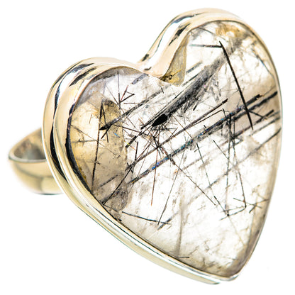 Heart-shaped sterling silver ring, clear quartz with dark needle-like inclusions, angled view