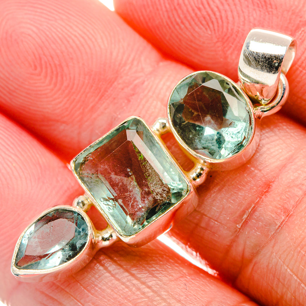 Faceted green fluorite pendant with oval and square stones in sterling silver setting