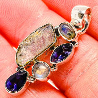 Sterling silver multi-stone pendant with purple teardrop and iridescent stones cluster