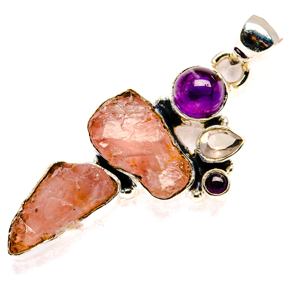 Sterling silver pendant featuring rough pink quartz stones with amethyst, white quartz, black onyx