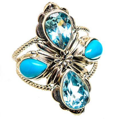 Silver oval blue gemstone ring with four turquoise cabochons and ornate rope detailing