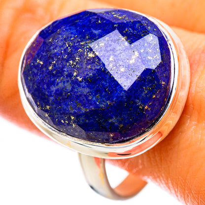 Sterling silver ring with oval lapis lazuli cabochon, blue stone bezel setting