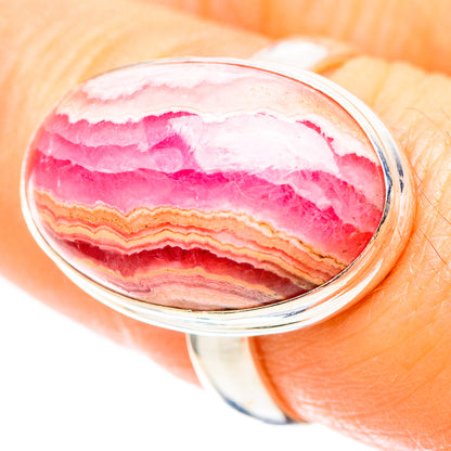Oval pink rhodochrosite cabochon ring in polished 925 sterling silver bezel