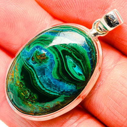 Oval malachite-in-chrysocolla pendant in 925 sterling silver with teal, green, and blue cabochon.