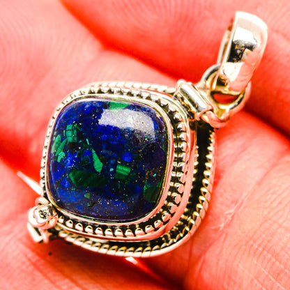 Sterling silver azurite pendant with oval blue-green stone and ornate beaded frame