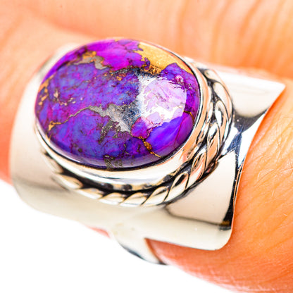 Oval purple turquoise cabochon sterling silver ring with ornate twisted band