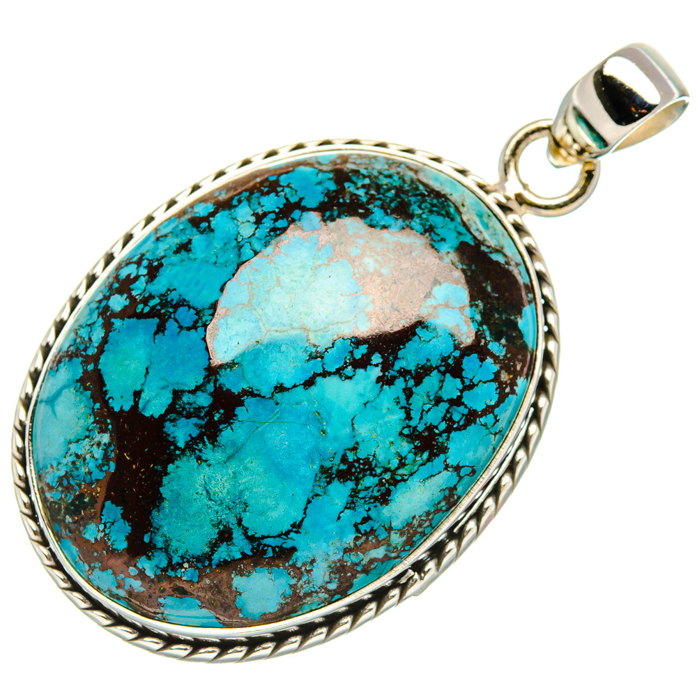 Turquoise oval pendant with dark matrix cabochon and silver bezel, loop bail