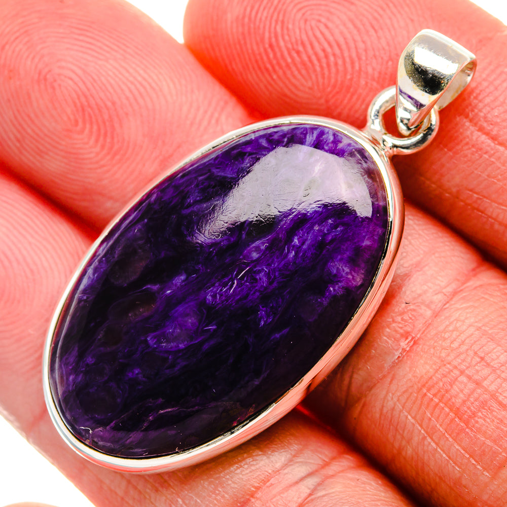 Oval charoite gemstone pendant in 925 sterling silver bezel with loop bail