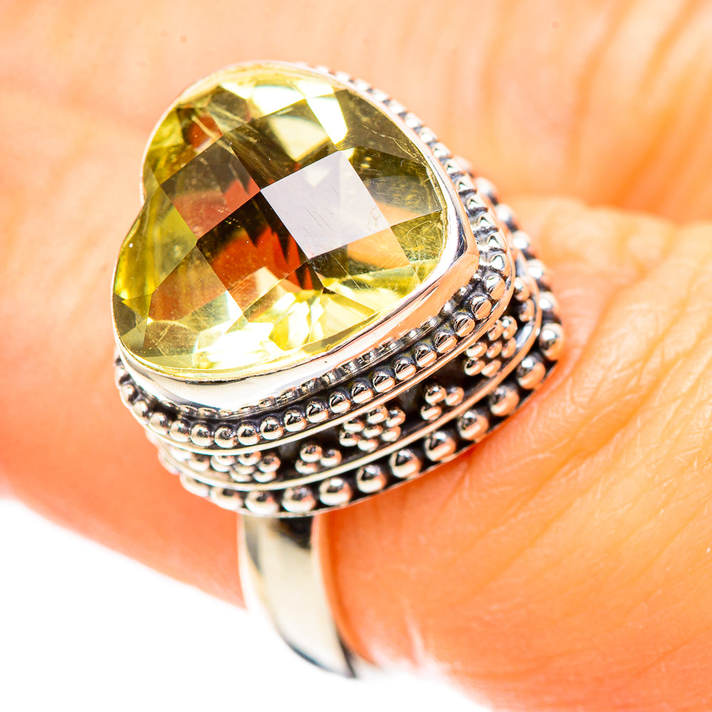 Sterling silver ring with faceted lemon-yellow quartz heart and beaded gallery setting