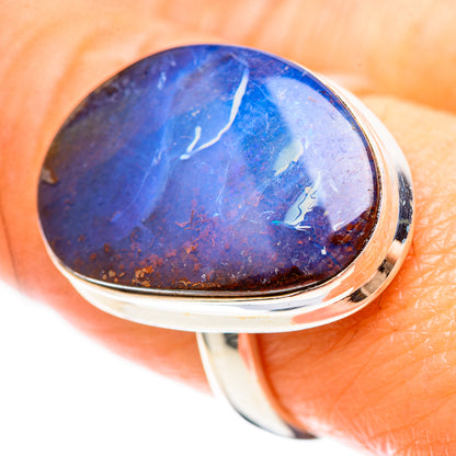 Sterling silver ring with round-oval blue boulder opal, reflective bezel