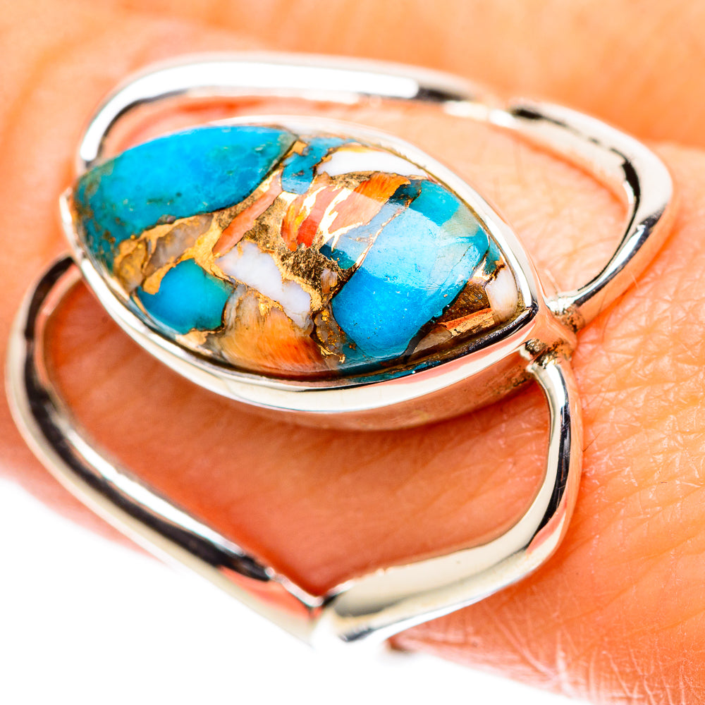Oval turquoise and orange-brown inlay sterling silver ring, openwork band detail