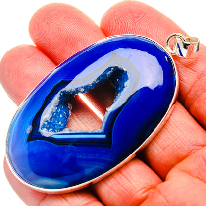 Blue window druzy pendant with oval blue druzy stone and silver bail