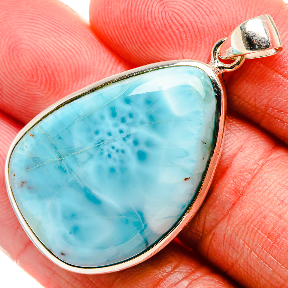 Silver bezel Larimar teardrop pendant with bail; blue stone, natural pattern