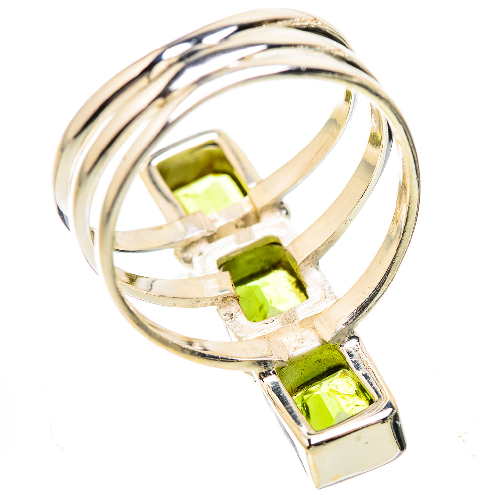 Sterling silver ring with three square green peridot gemstones and twisted band