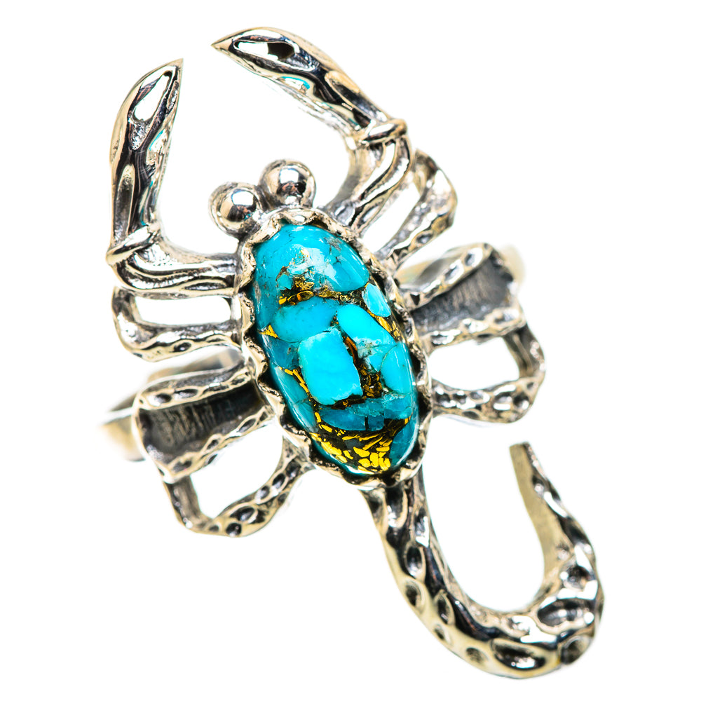 Silver-tone openwork turquoise cabochon ring with oval stone and detailed prongs