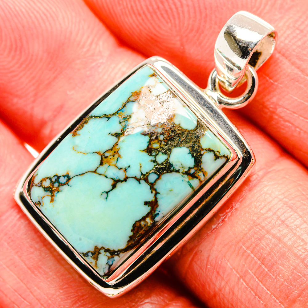 Tibetan turquoise pendant in 925 sterling silver with rectangular stone and bail