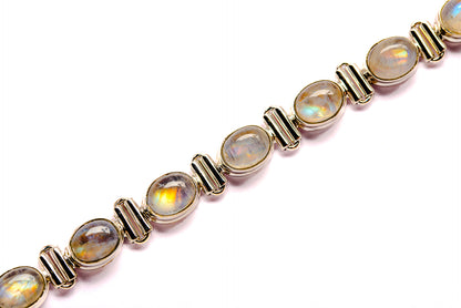 Sterling silver bracelet with oval rainbow moonstone cabochons and bar connectors