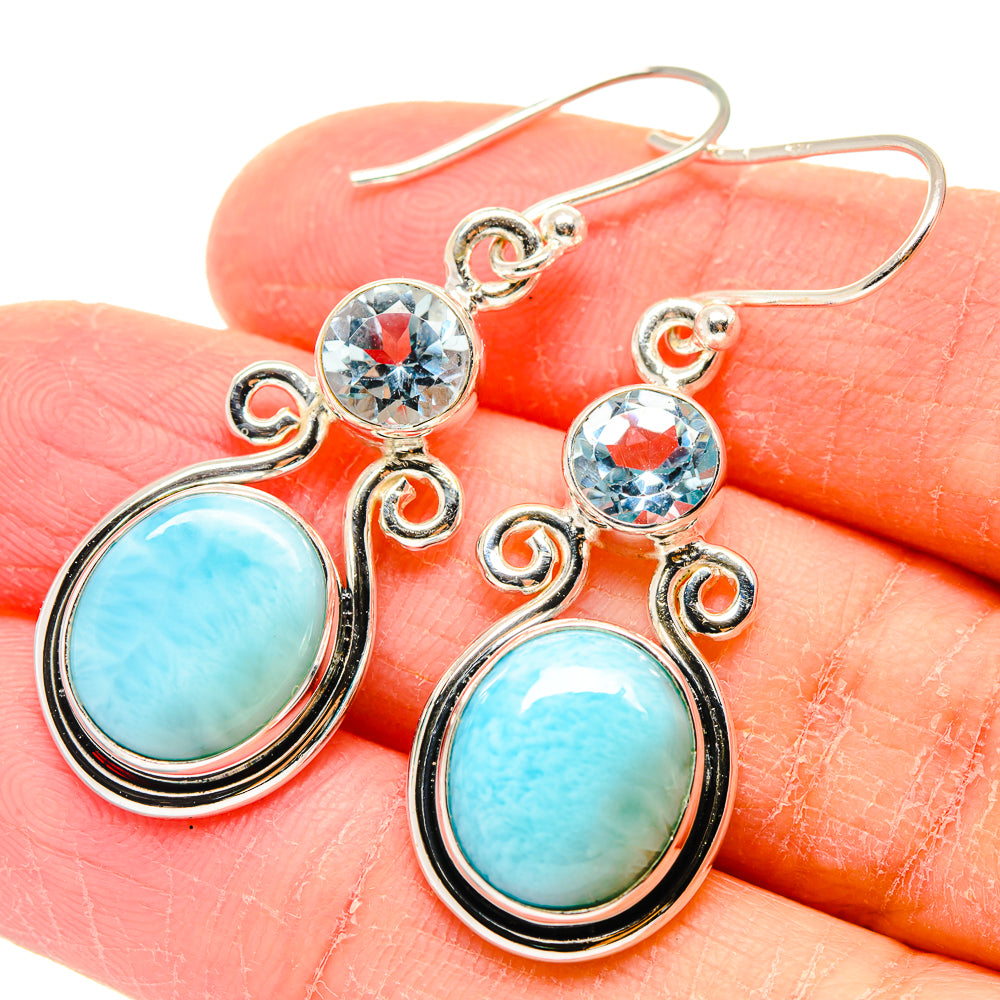 Blue gemstone drop earrings with round blue topaz accents, silver-tone hooks