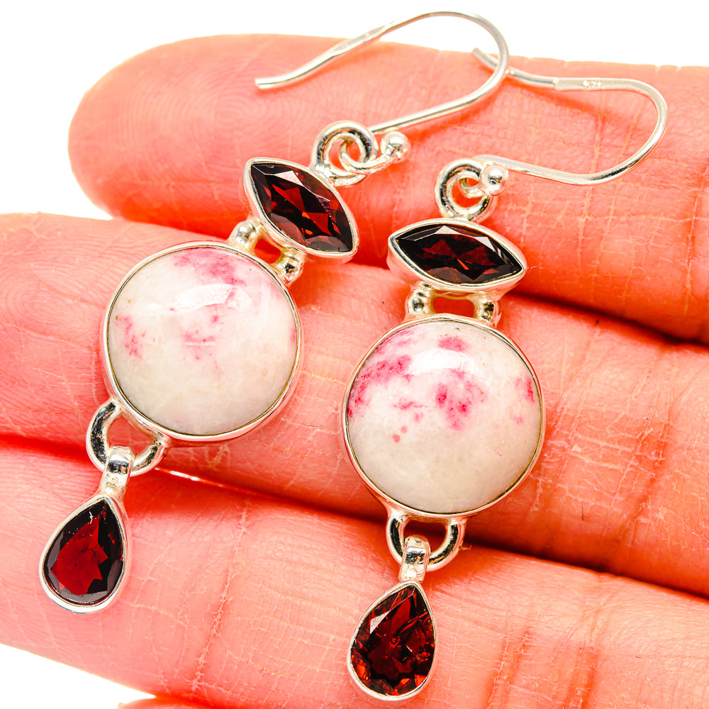 Silver drop earrings with round pink cabochon, dark red marquise garnet, and teardrop charm