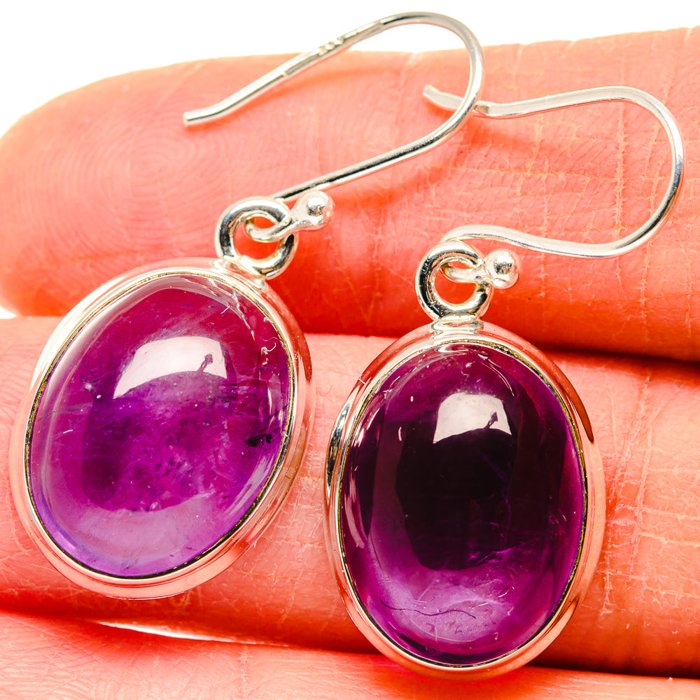 Oval purple amethyst cabochon drop earrings in 925 sterling silver with hook backs
