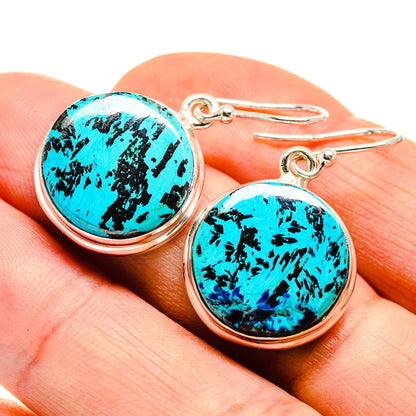 Oval turquoise stone earrings with black matrix pattern, sterling silver bezel and hooks