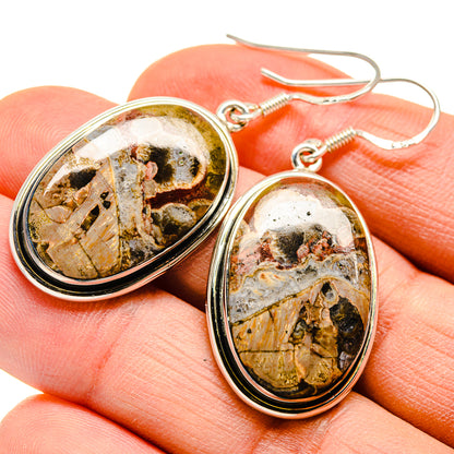 Oval poppy jasper drop earrings with sterling silver bezel and hook backs.