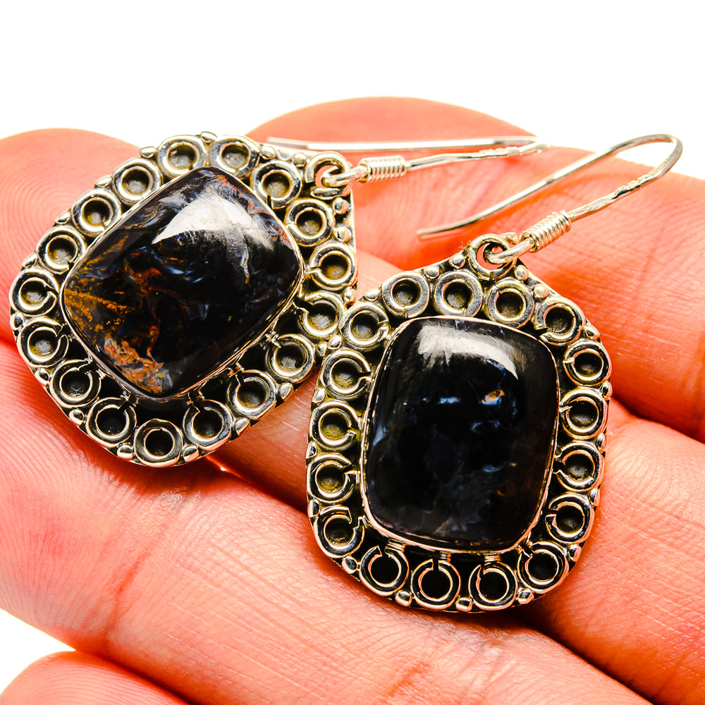 Oval dark pietersite earrings with ornate sterling silver frame and fishhook backs