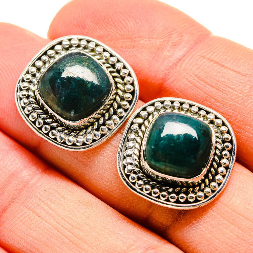 Silver stud earrings with green moss agate oval cabochons and beaded halo settings