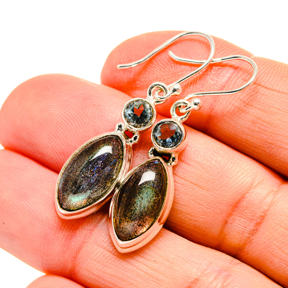 Sterling silver drop earrings with blue round stones and oval labradorite centers