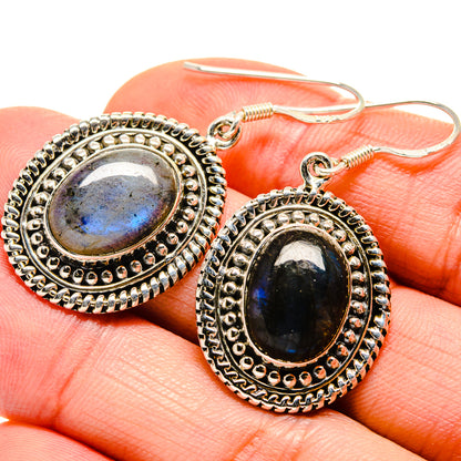 Silver oval labradorite drop earrings with beaded bezel and fishhook backs