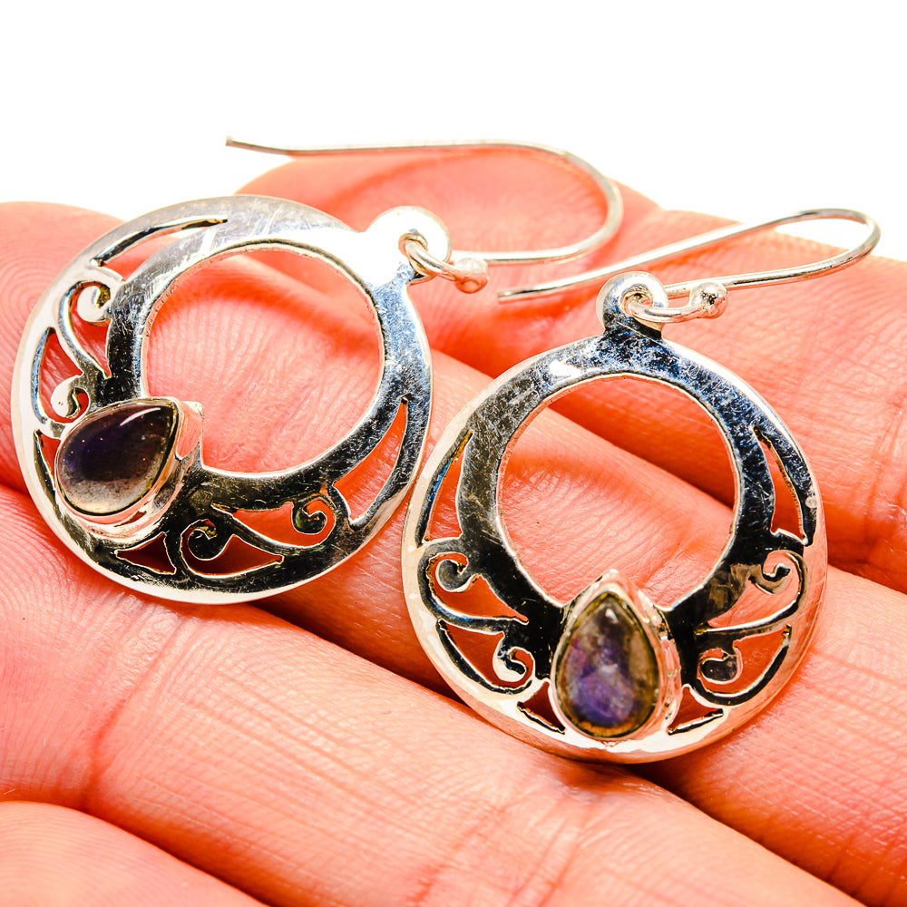 Sterling silver hoop earrings with purple labradorite cabochon and ornate filigree