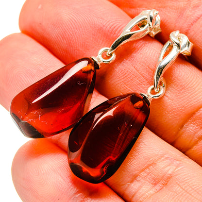 Baltic amber drop earrings in 925 sterling silver, dark red teardrop stones