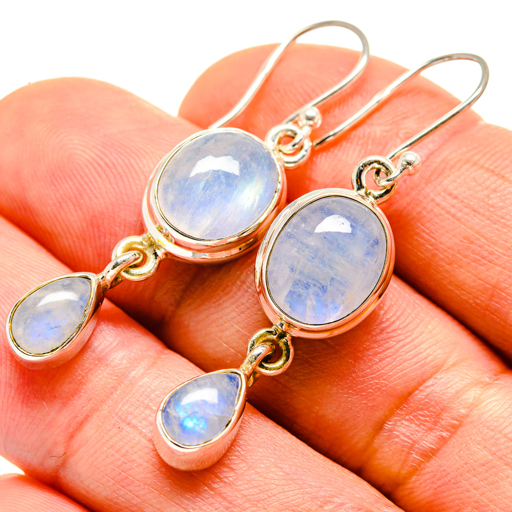 Oval rainbow moonstone drop earrings in gold-tone silver with hoop hooks