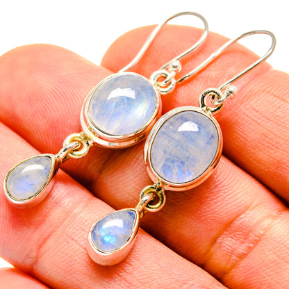 Oval rainbow moonstone drop earrings in gold-tone silver with hoop hooks
