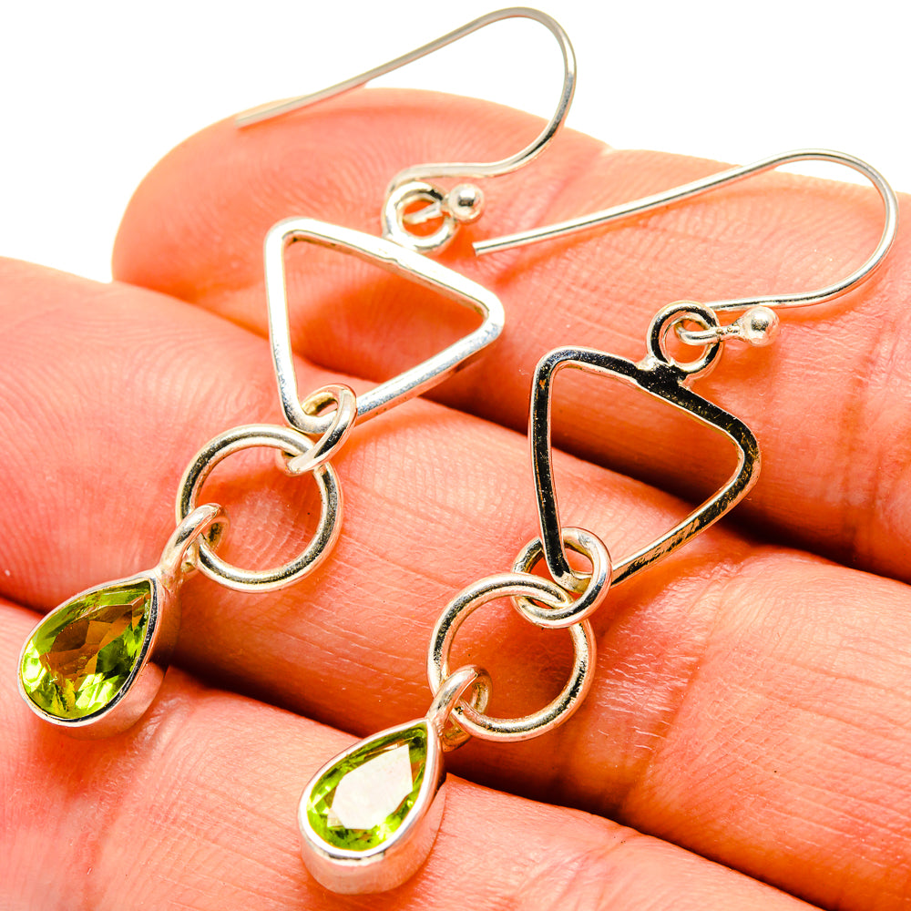 Peridot teardrop earrings with triangular links, green stones, fishhook on silver-tone