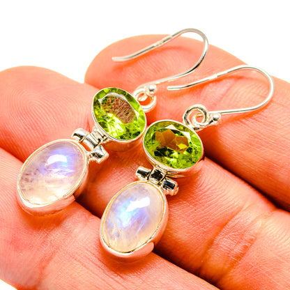 Sterling silver drop earrings with round green peridot and oval iridescent moonstone dangles