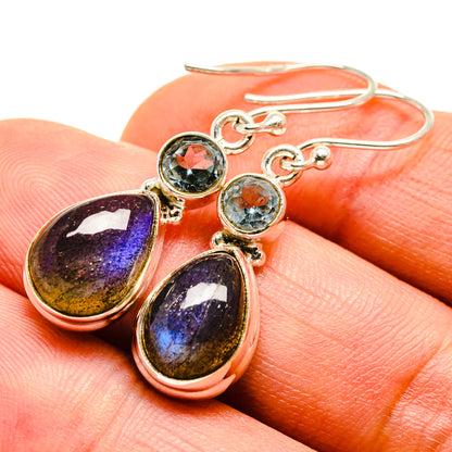 Sterling silver drop earrings with blue-green round and teardrop labradorite charms