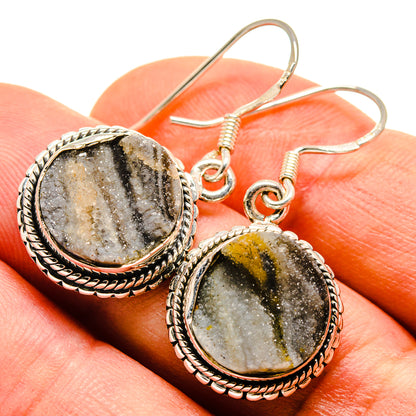 Oval druzy stone drop earrings with rope border, silver-tone hook wires and mottled gray and gold
